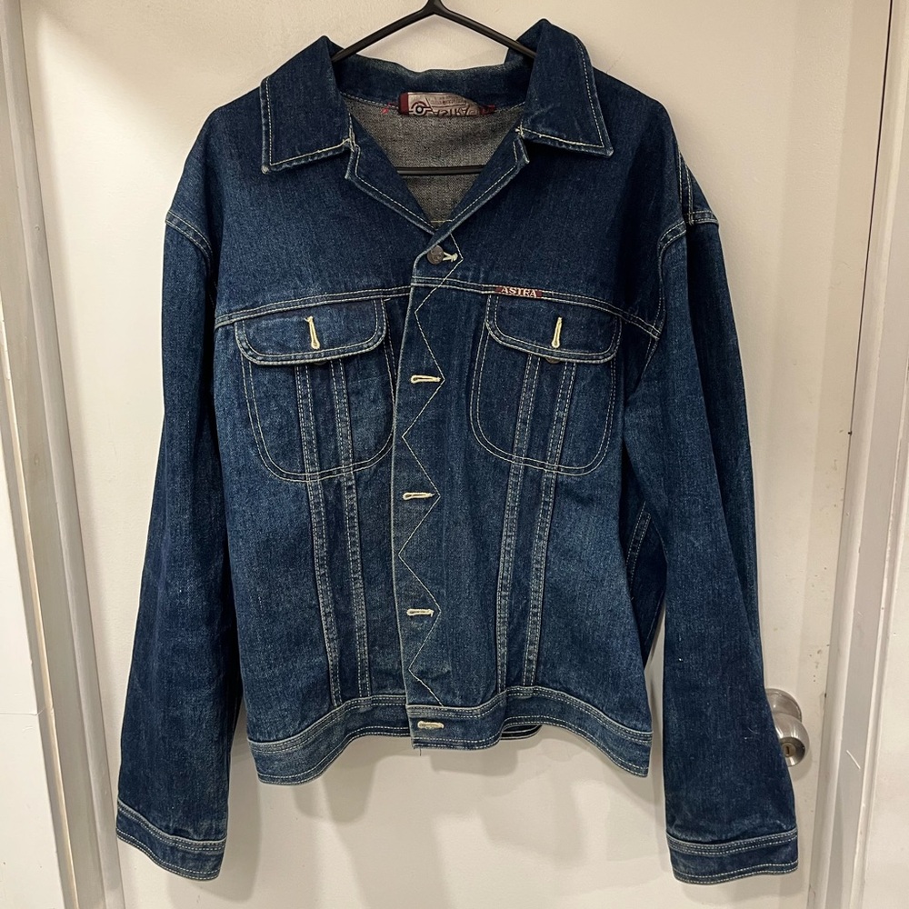 denim jacket with gold accents